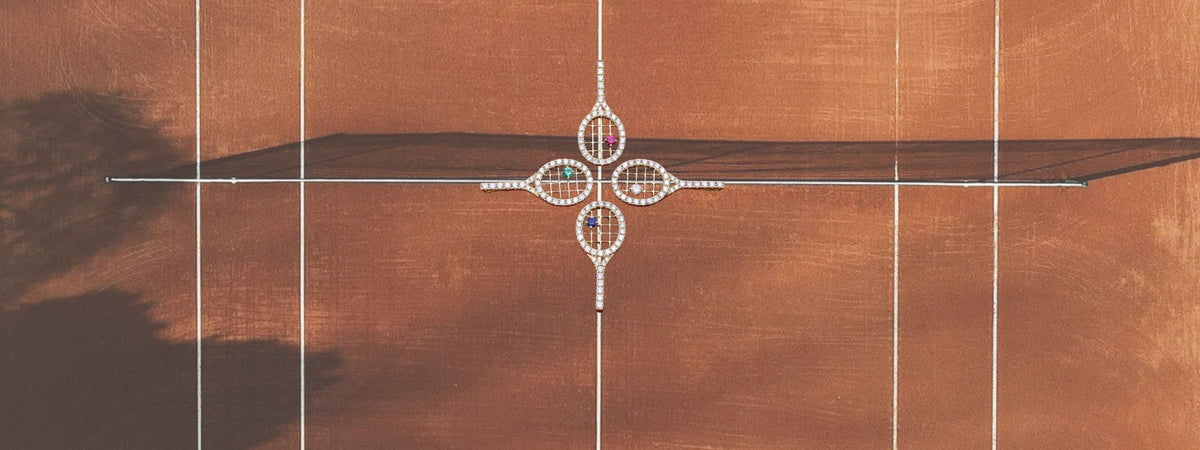 Featuring four tennis pendants on the court