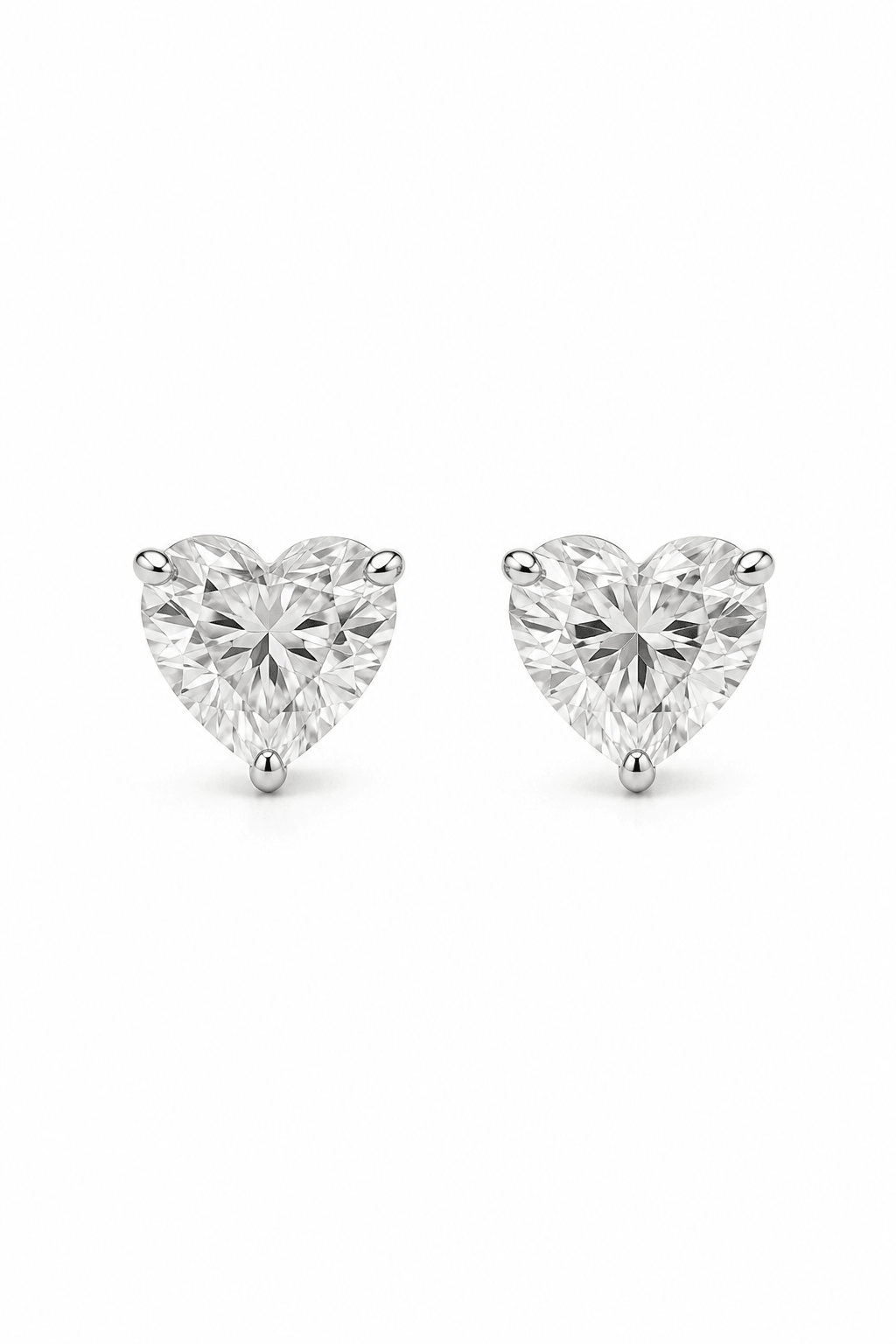 Heart-shaped diamond stud earrings in 18k gold by EMBLUME