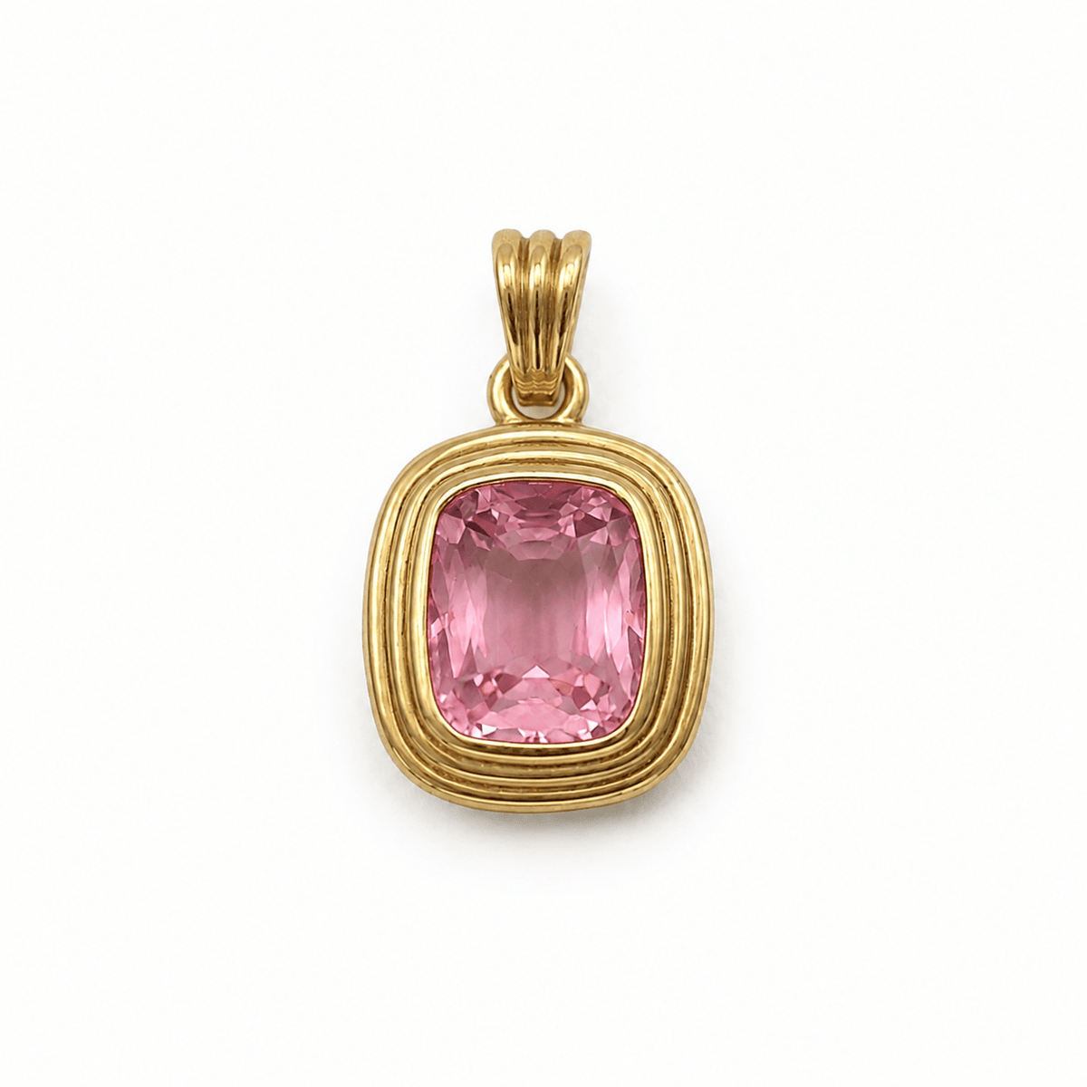 Pink spinel bezel pendant with layered yellow gold setting by EMBLUME