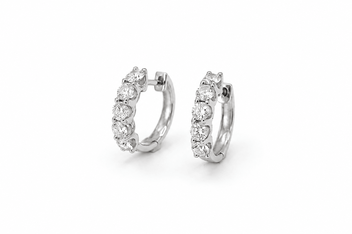 Diamond huggie earrings with 1.15 carat brilliant-cut diamonds in white gold by EMBLUME Fine Jewellery